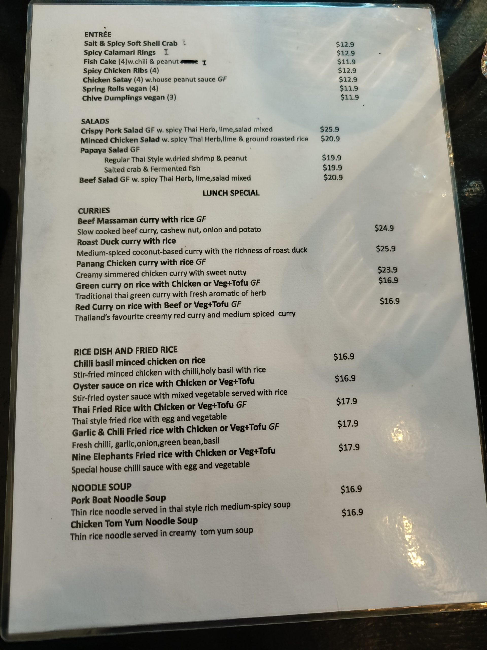 Nine Elephants Docklands menu showing curries and fried rice options